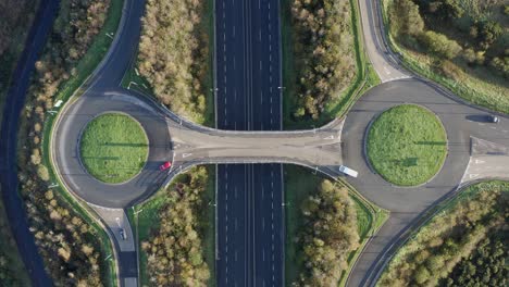 Sparse-vehicle-traffic-at-two-interchange-roundabouts-over-freeway