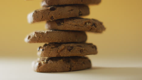 Video-of-biscuits-with-chocolate-on-yellow-background