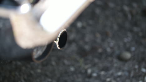 close-up of wedding rings on reflective table