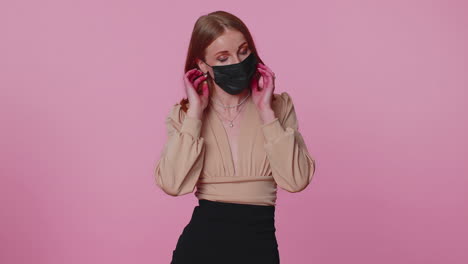 sad unhappy girl putting on face hygienic medical mask to prevent respiratory coronavirus infection