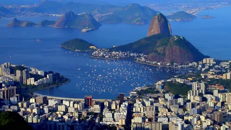 Aerial-view-of-Guanabara-Bay,-mountain-Sugar-Loaf-and-Botafogo-seen-from-Christ-the-Redeemer-in-summer-afternoon,-Rio-De-Janeiro,-Brazil