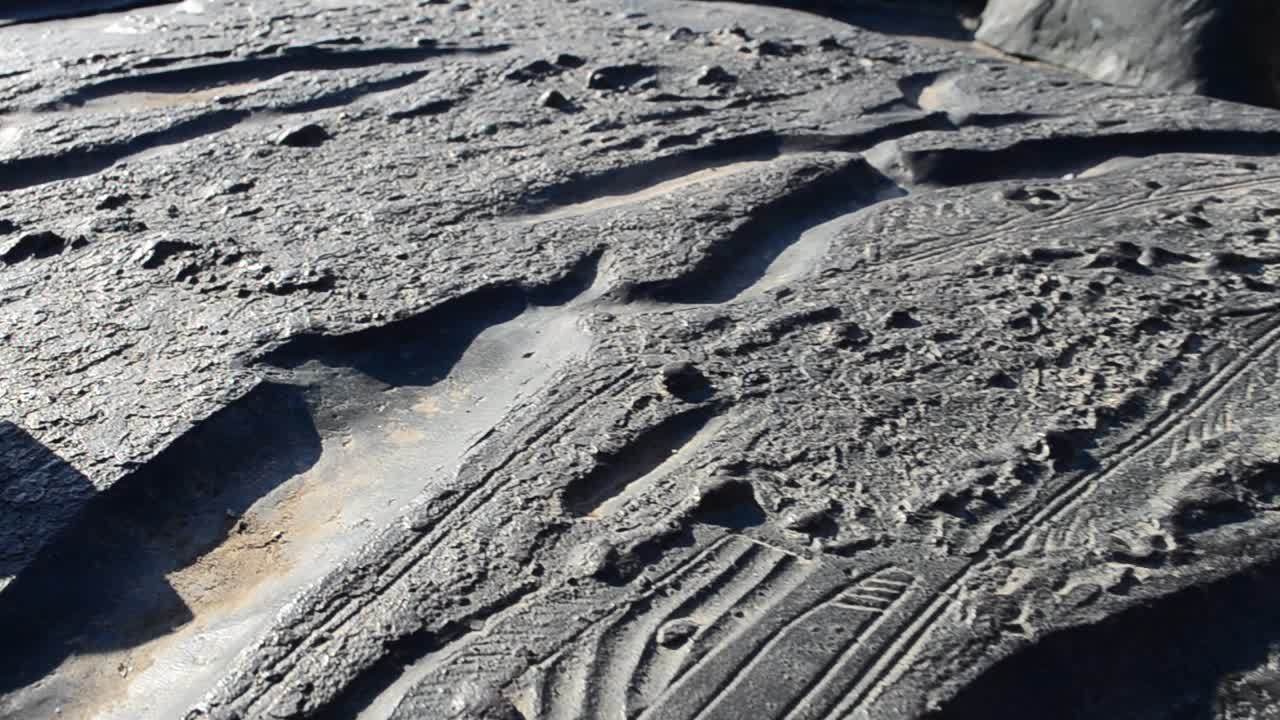 Topography on a stone. Shooting of a city topographic map, monument