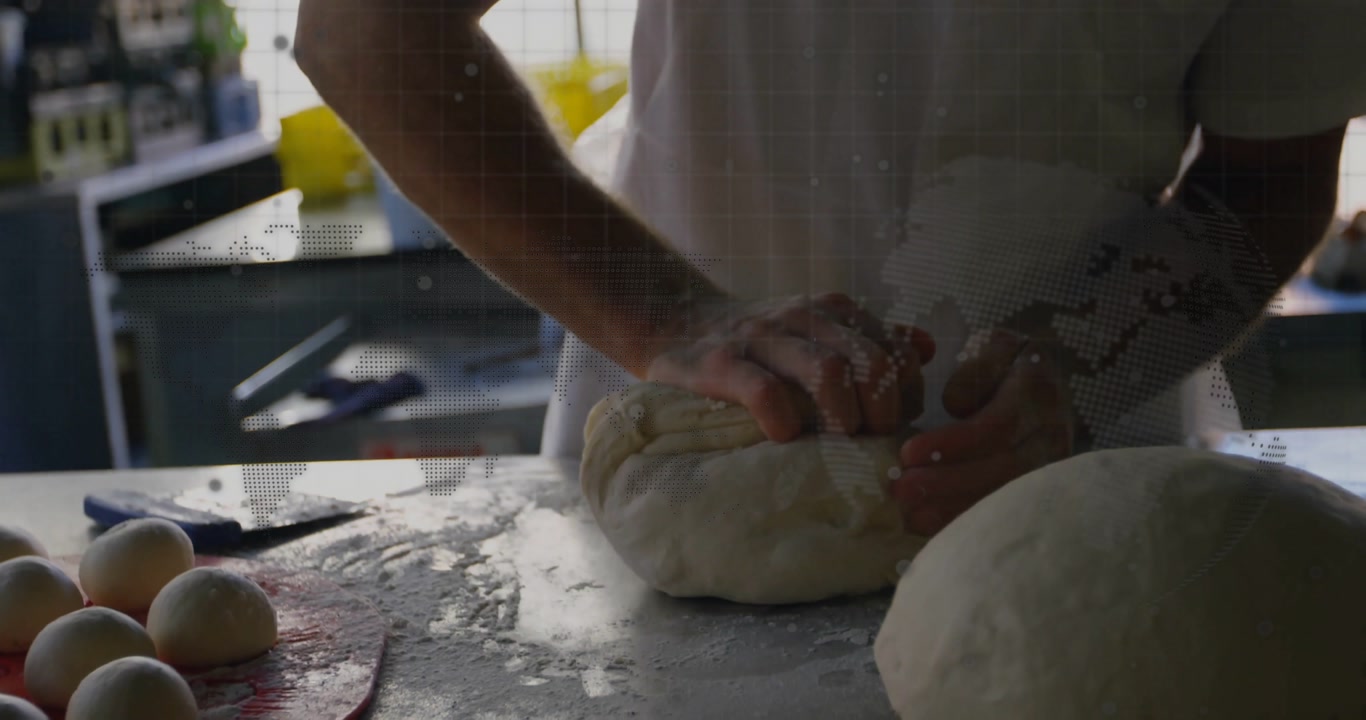 Baker pressing and stretching dough in bakery workspace, showing animated grid and dot patterns