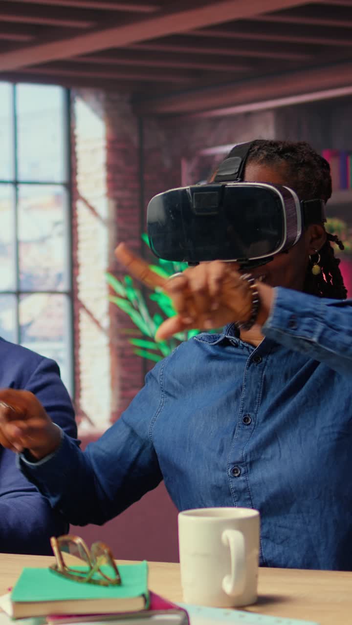 African American Woman Experiencing Virtual Reality in Office