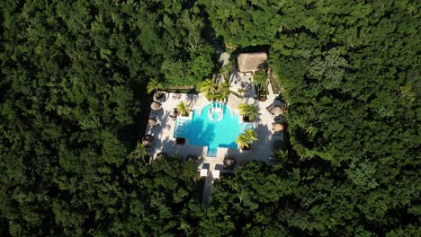 luxury villa and swimming pool in tropical jungle secluded mansion in rainforest of mexico