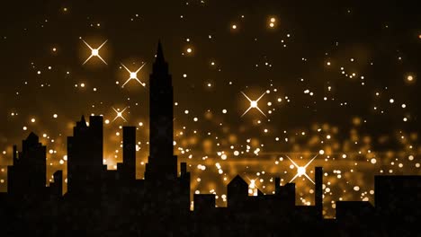 yellow sparkles and glowing spots moving against silhouette of cityscape in background