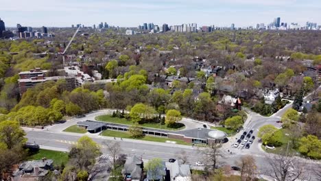 aerial view of a toronto suburb in the summer with cyclists on the road