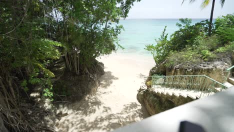 beach access to lonely tropical bech in barbados island caribbean sea