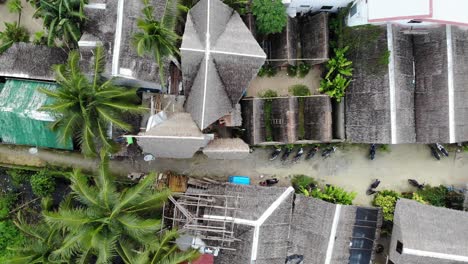 barn roofs and road in tropical countryside