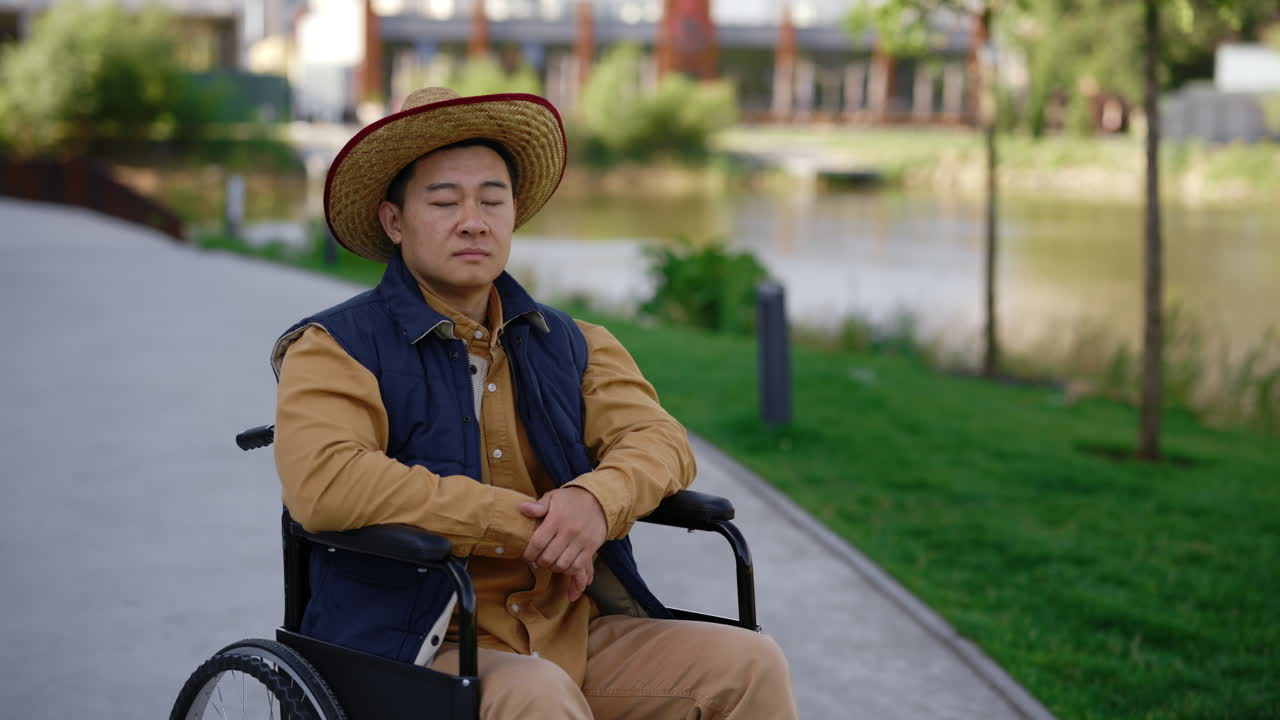 Man in Wheelchair in a Park