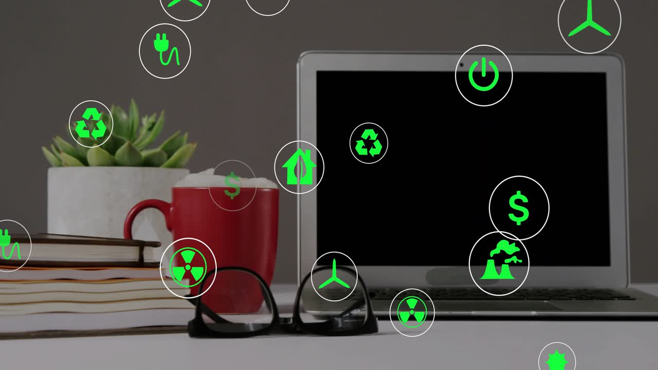 Icone verdi che entrano nell'inquadratura e fluttuano su un laptop argentato, raggruppandosi e mostrando concetti energetici.