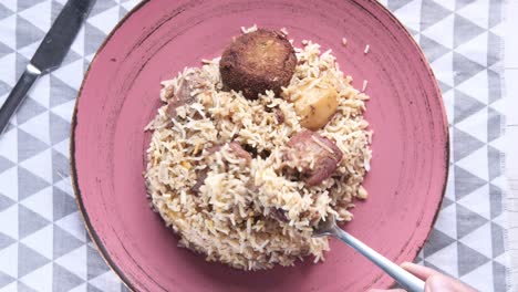 delicious biriyani with meat and vegetables