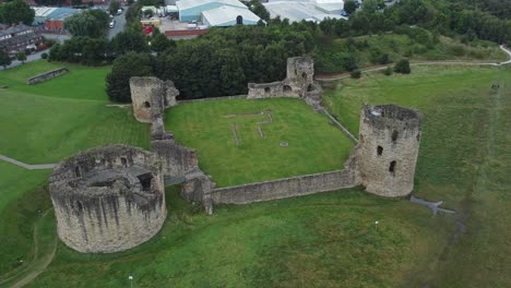 flint castle welsh medieval coastal military fortress ruin aerial view high orbit left