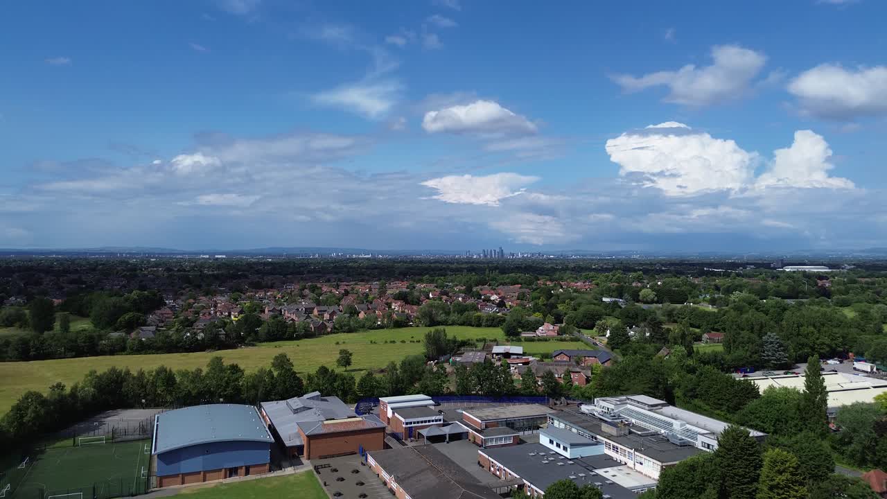 Wide view from South Manchester, UK towards the city center on a sunny day