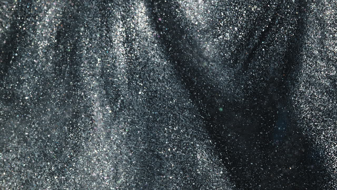 Ripresa macro di una texture luccicante per un concetto artistico di miscelazione dell'inchiostro