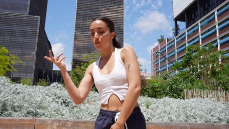 woman in sportswear in a city park