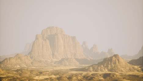 stunning rock formations under hazy sky at sunset in a desert landscape