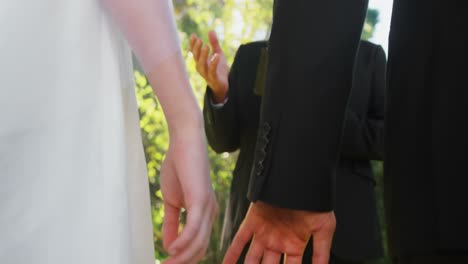 Groom-and-bride-holding-there-hands-4K-4k