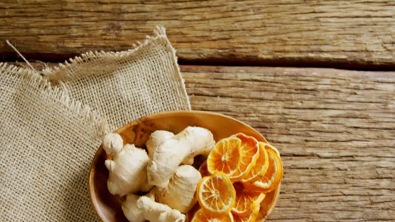 Dried orange with ginger in a plate 4k