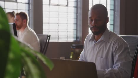 Young-creative-professionals-working-in-a-modern-office