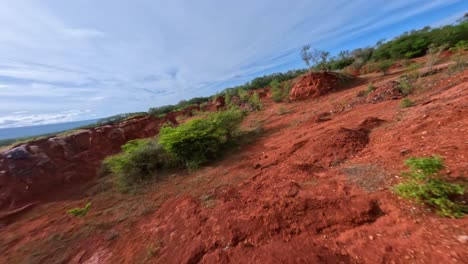 Aerial-flyover-red-mining-area-in-Pedernales-during-sunny-day,Dominican-Republic