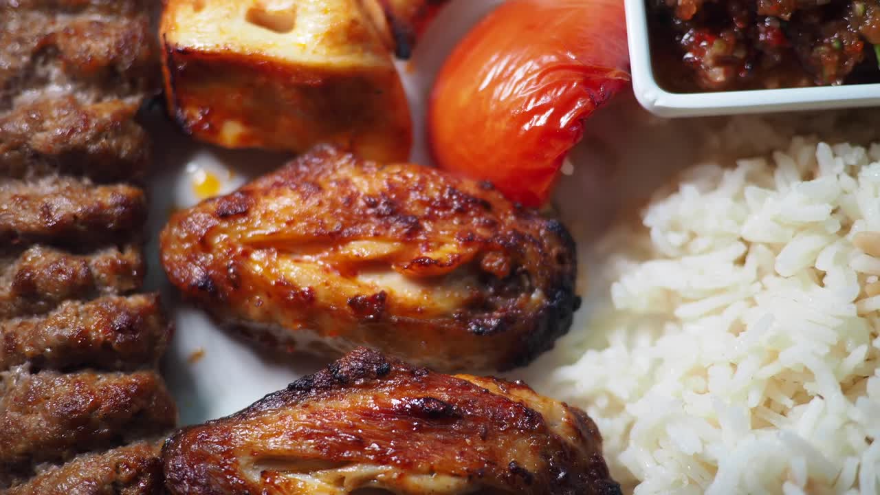 Delicious Iranian Cuisine with Kebab and Grilled Chicken Wings