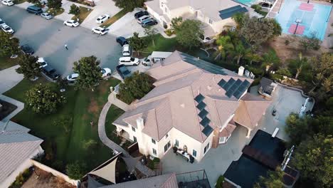 Aerial-View-Of-Wedding-Location-With-Big-White-Houses-and-Cars