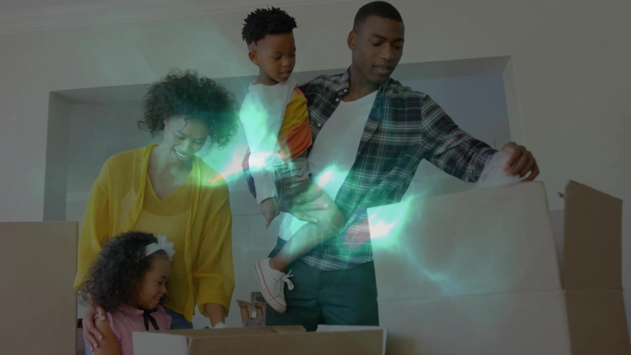 Father opening box mother giving plush toy daughter taking while teal overlay following during move