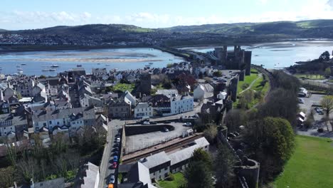 Welsh-tourism-holiday-cottages-enclosed-in-Conwy-castle-battlements-stone-walls-aerial-view