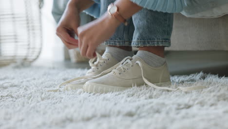 shoes, lace and hands of woman in bedroom untie