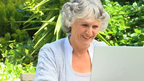 Mature-woman-working-on-her-laptop-