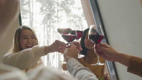 friends toasting with wine