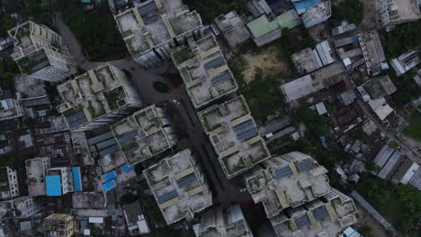 densely populated city buildings, downtown residential apartment blocks, aerial
