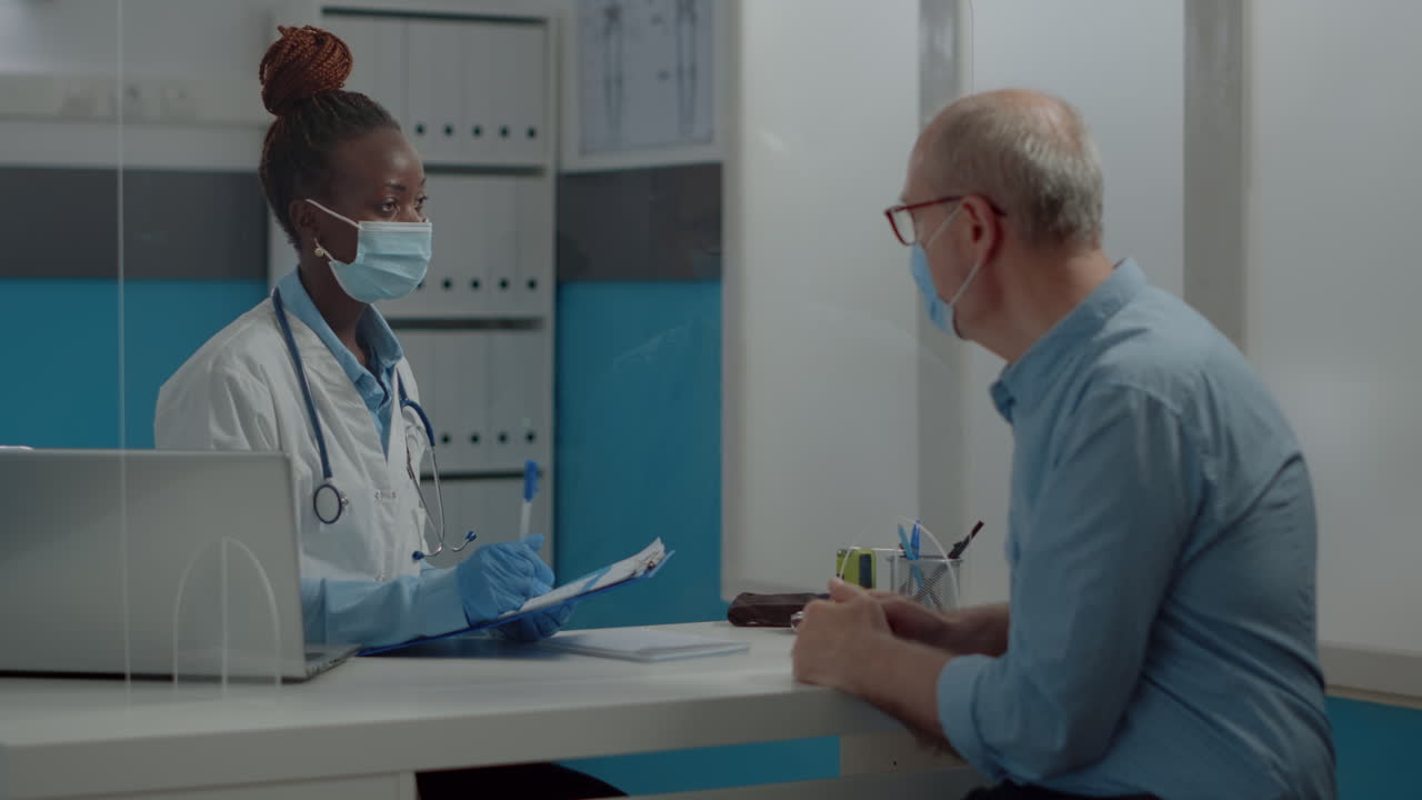 Consulta con el médico y el paciente