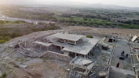 the hesarak military compound, seen from above, lies in ruins