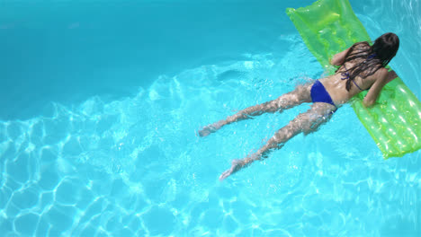 brunette swimming with lilo