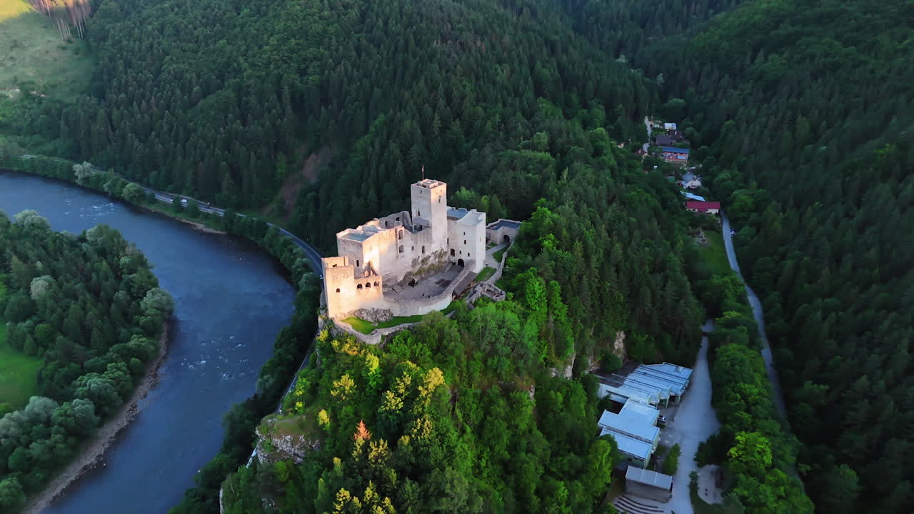Distancing from the Strecno Castle locating on the top of the rock. Spectacular green Tatra mountains around. Slovakia landmark