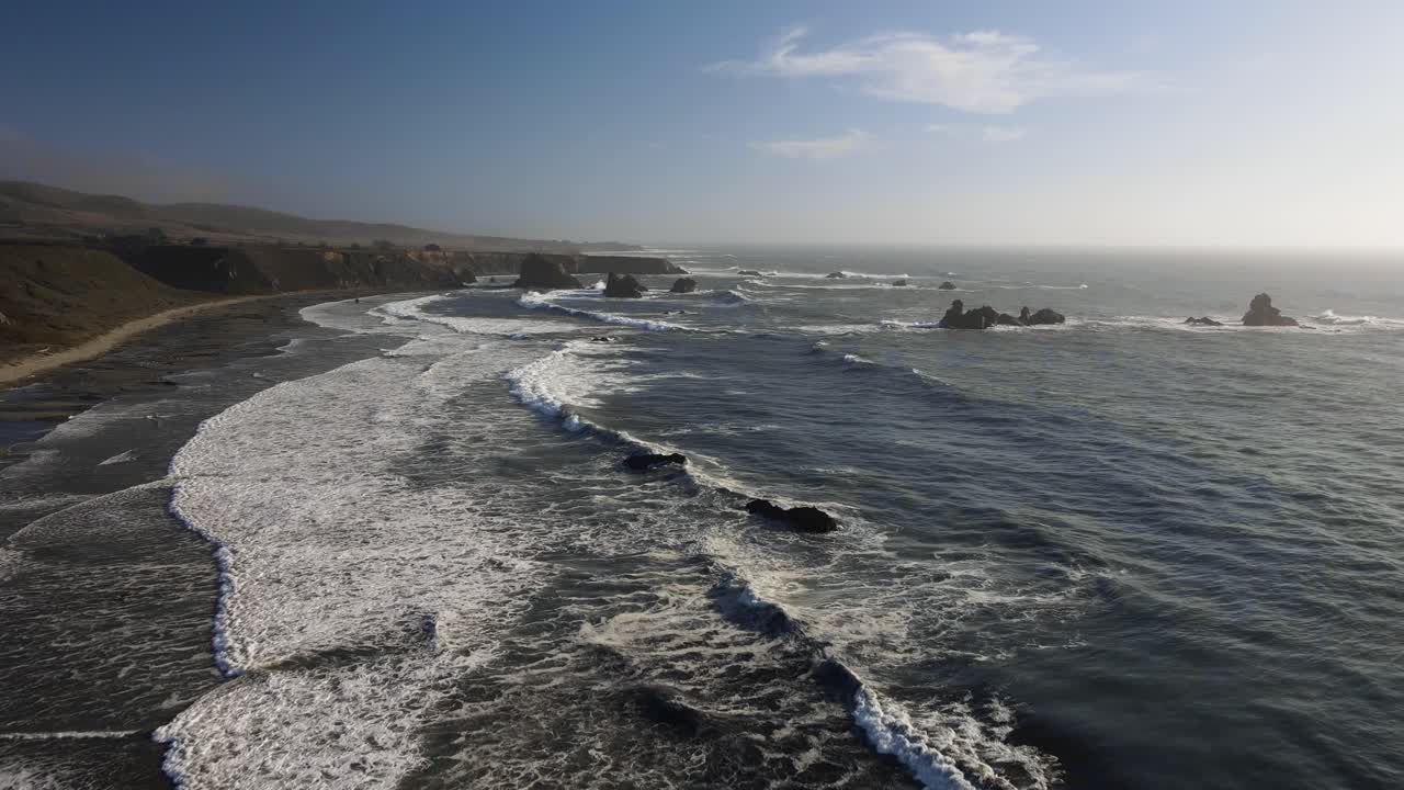 Amazing aerial shot of rocks in the Pacific Ocean in a Californian coast