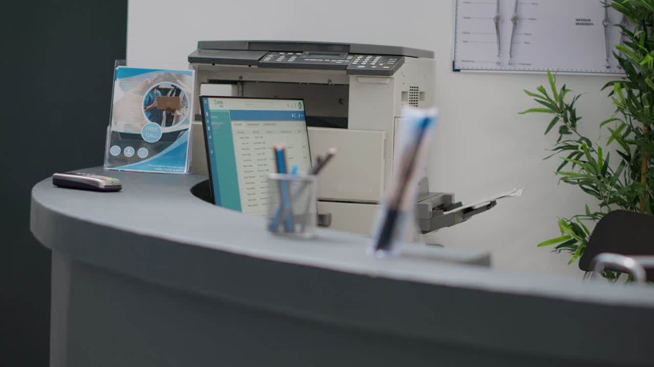 Reception desk with printer and screen