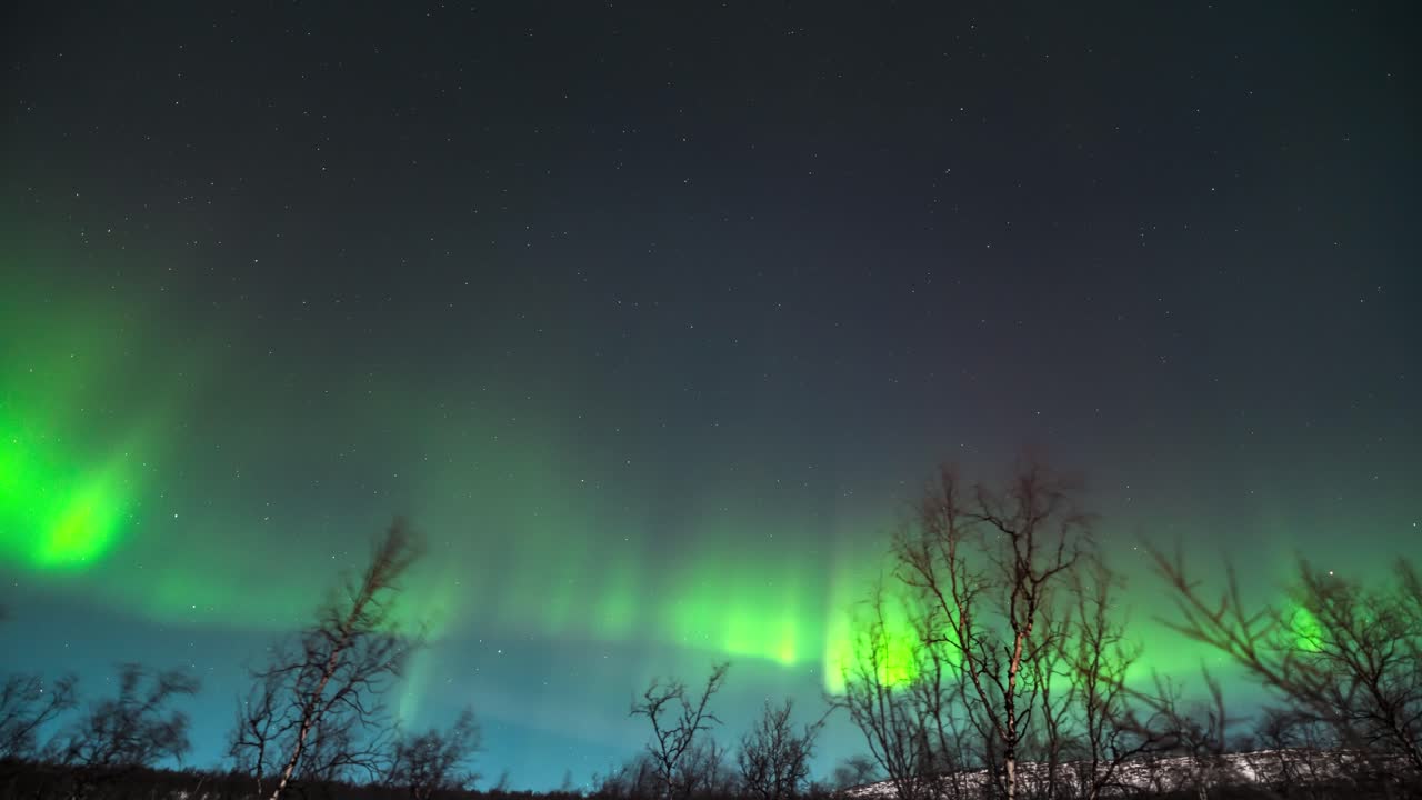 Northern lights dance over Kilpisjärvi in a stunning timelapse of the Arctic sky
