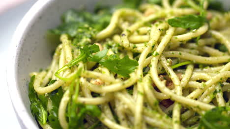 bowl of pesto with pinenuts and rocket