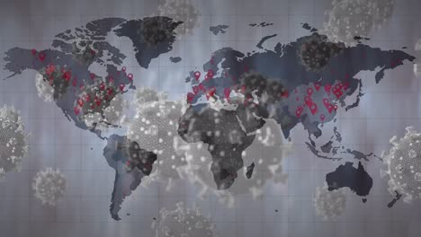 digital animation of multiple covid-19 cells floating against world map on grey background