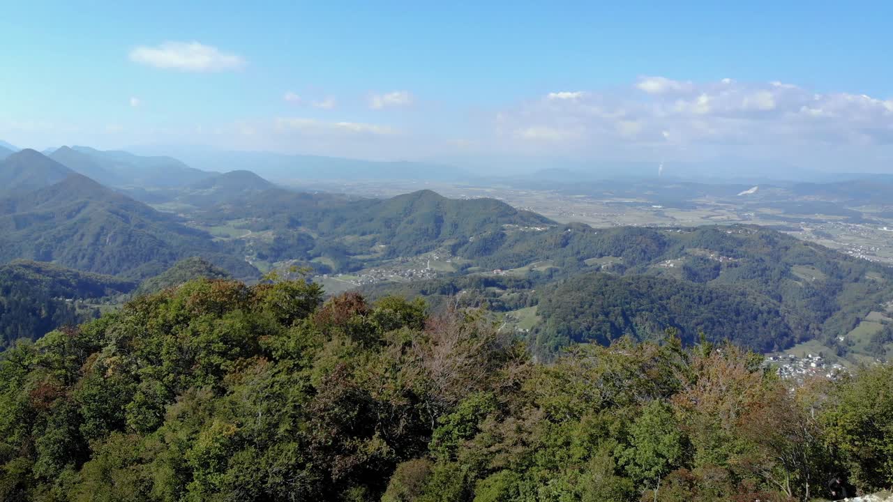 Aerial Past Large Wooden Cross A Top Hill Top On Slovenia. Follow Shot
