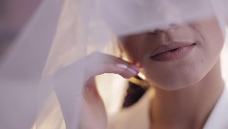 a beautiful bride in a white veil