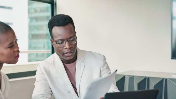 Business people, meeting and documents