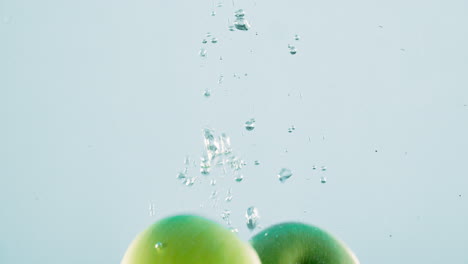 green apples in water