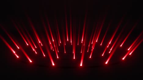 red light beams on a dark stage