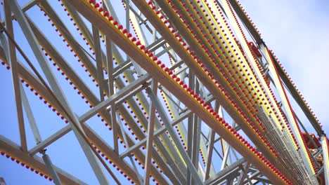 red ferris wheel in the city park.