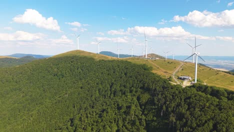 aerial view of eco-friendly windmills generating power in bulgaria’s central mountains. ideal visual for sustainability and climate change topics