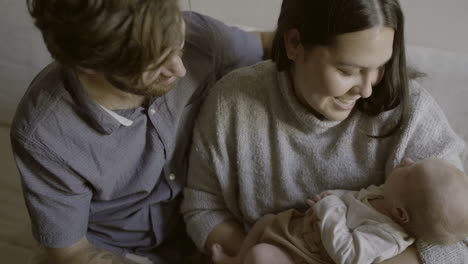 happy family with newborn baby